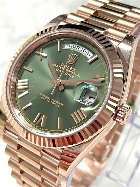 rose gold rolex day date.